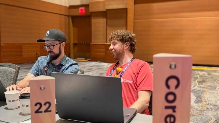 rtCamp's David Levine (right), Table Lead at the Core AI Prompt Bar, WordCamp US 2026.