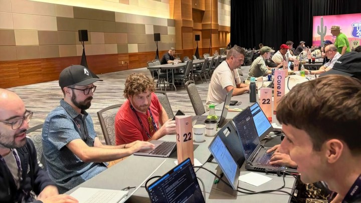rtCamp's David Levine (in the red t-shirt) at the Core AI Prompt Bar, WordCamp US 2026.
